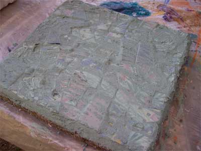 Spread the grout, smushing it between the pieces