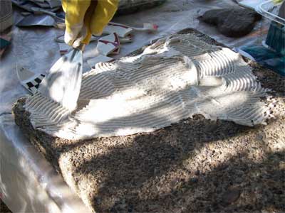 Spread the mortar evenly (about 1/4 inch thick)