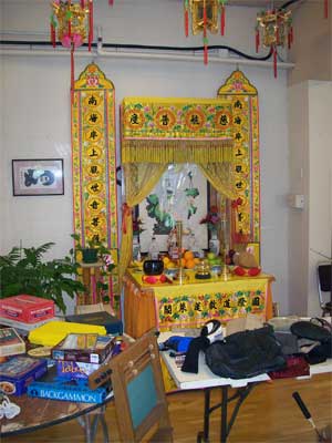 shrine with junk A shrine amongst the dribs and drabs.