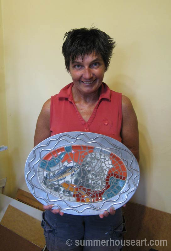 Mosaic Student Dianne with the finished mosaic dish, summerhouseart.com